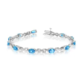 10K White Gold Oval Blue Topaz Stones And Diamonds Tennis Bracelet, 7"